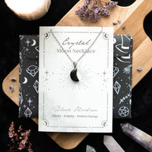 Load image into Gallery viewer, Black Obsidian Crystal Moon Necklace on Greeting Card
